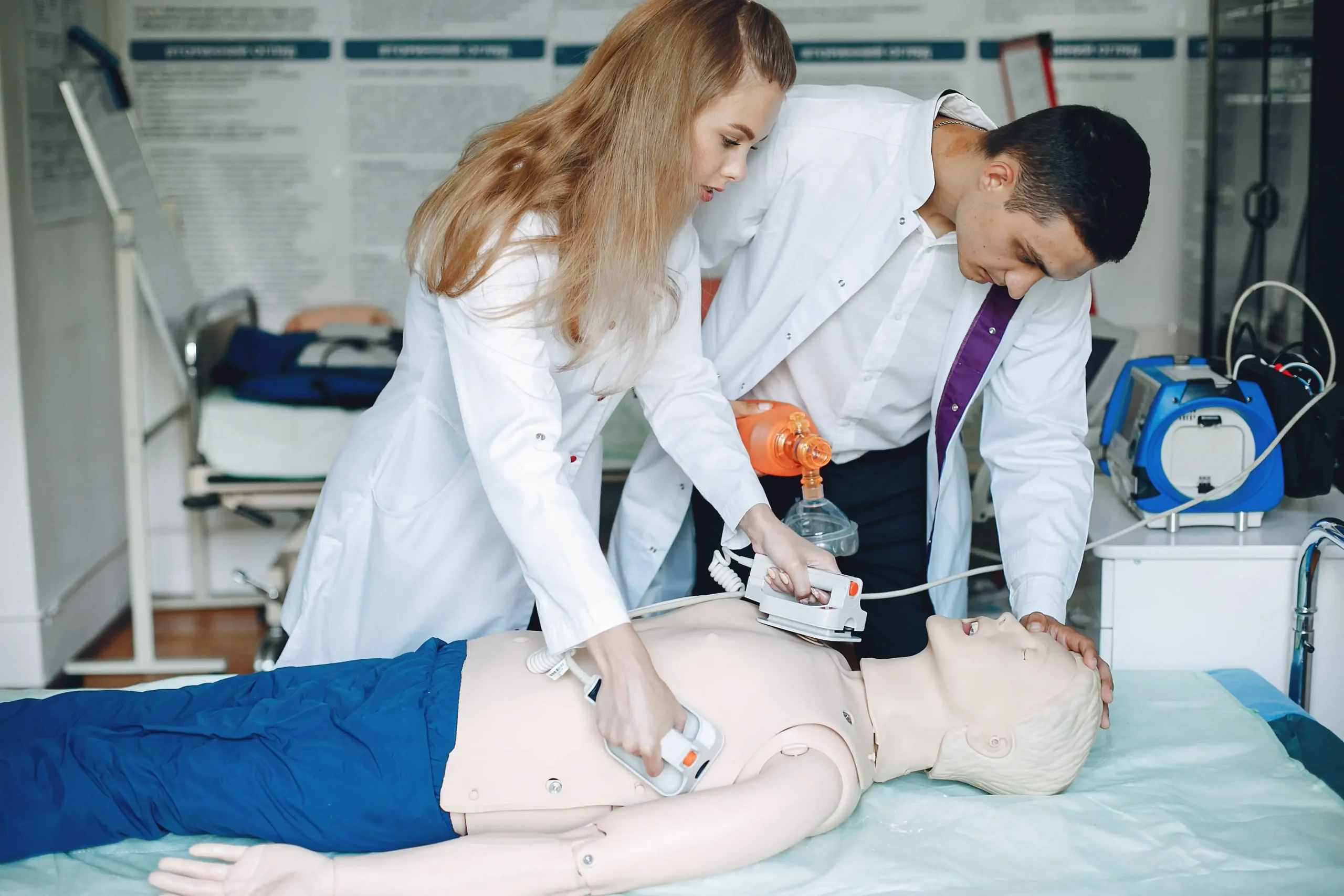 nurse conducts resuscitation doctor helps woman perform operation 2 min scaled